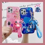 The cartoon Stitch phone case is equipped with a beautiful pendant